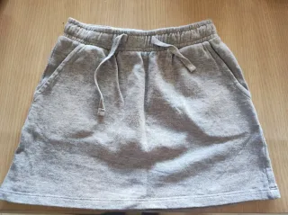 Shorts vaqueros desgastados talla 32 y falda