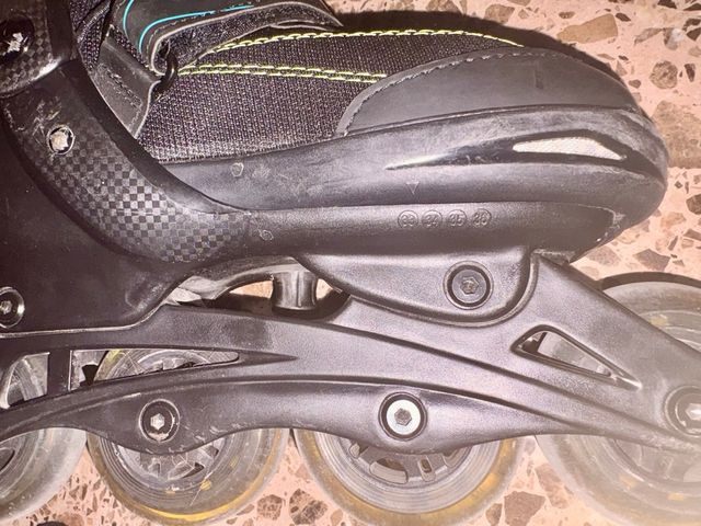 Patines en línea infantiles negros y turquesa