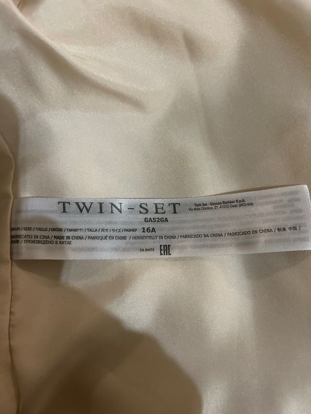 Pelliccia ecologica beige/bianca