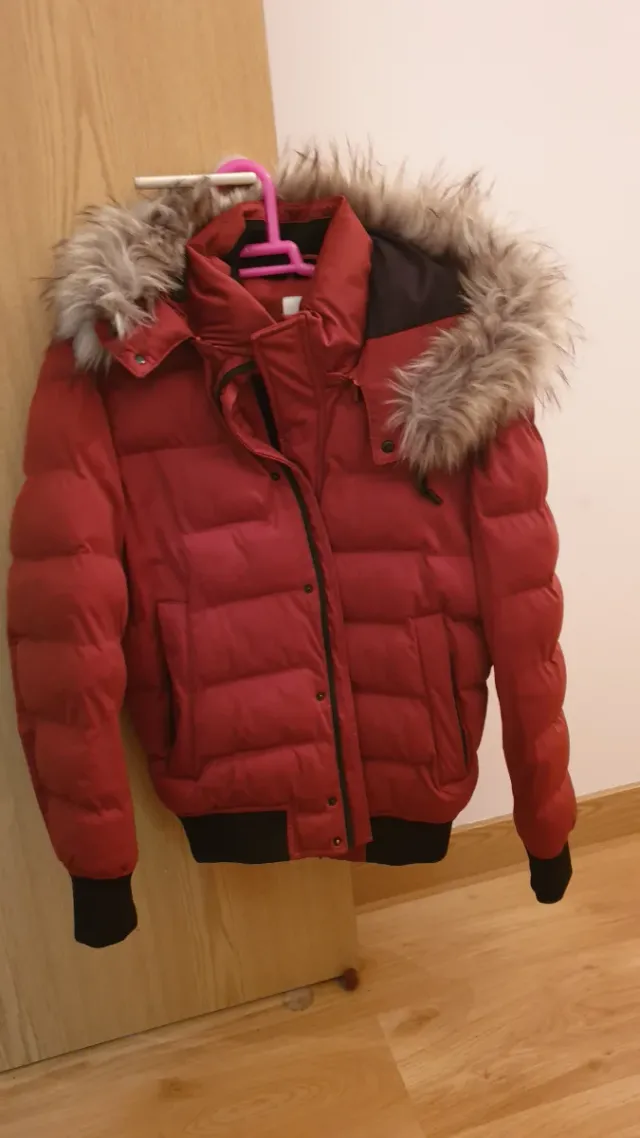 Abrigo plumas de Zara con pelo en capucha