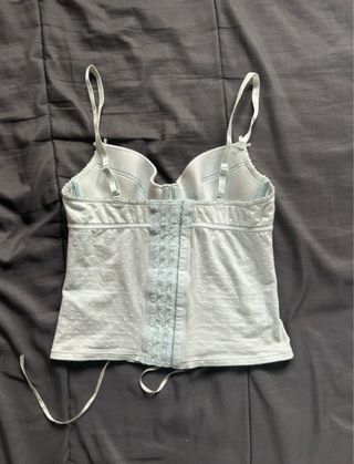 Corsé azul con cordones y lunares