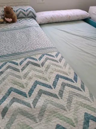 Cama nido negro y turquesa