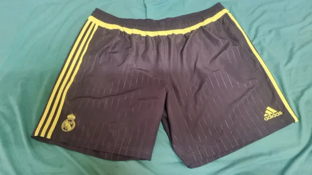 Pantalón corto Adidas Real Madrid gris y amarillo