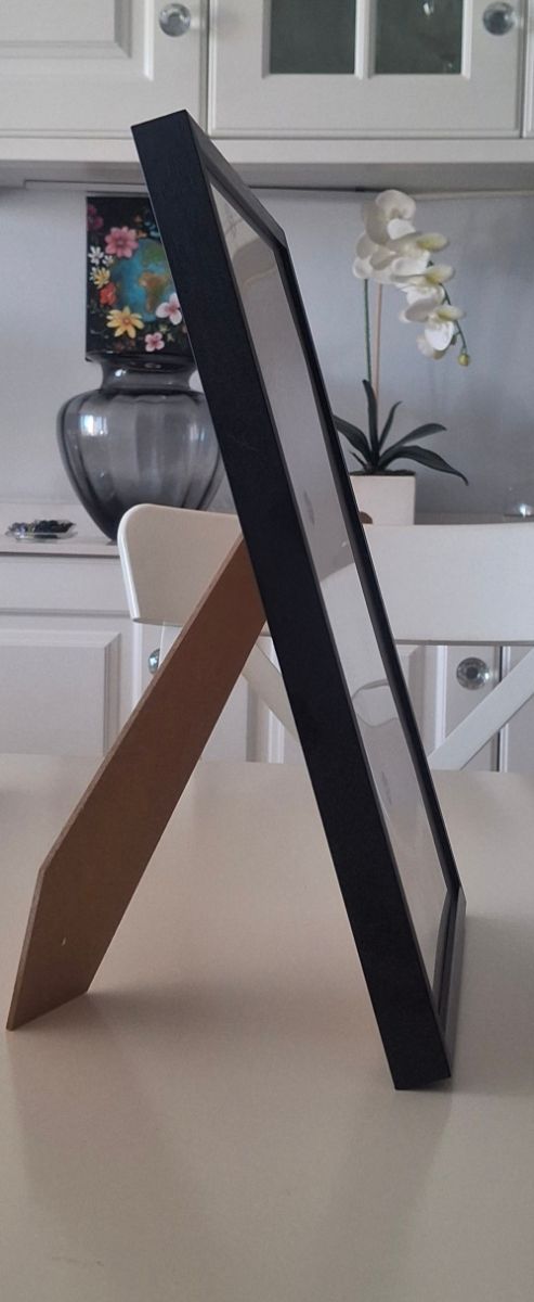 Marco de fotos negro de metal