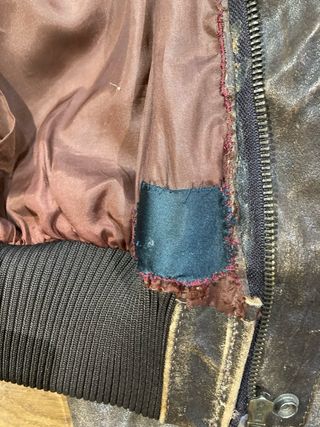 Cazadora piloto bomber cuero con cuello borrego