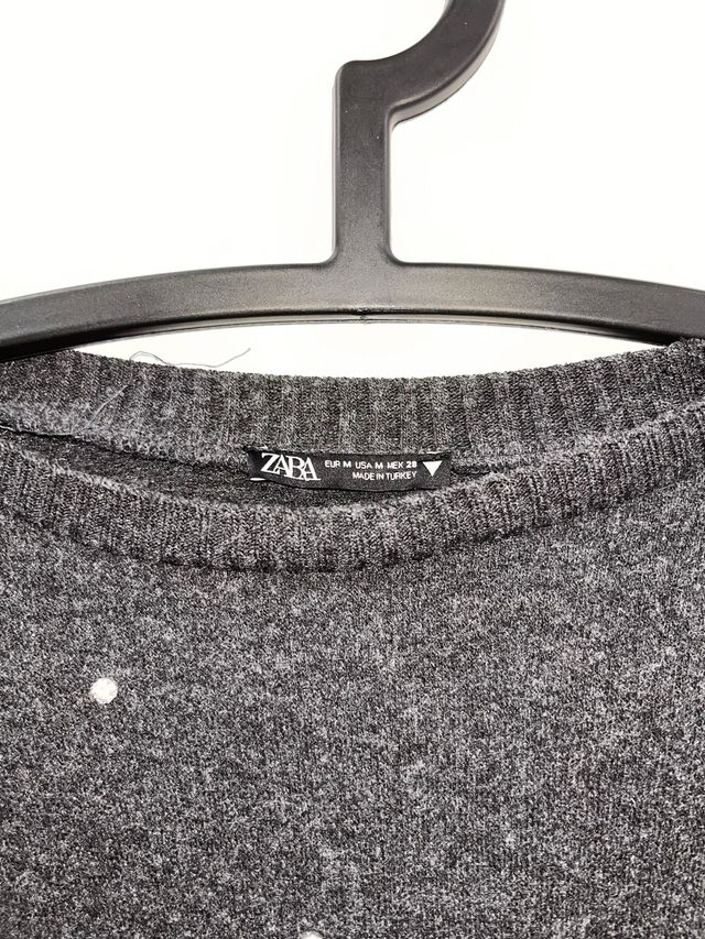 Jersey gris con pedrería