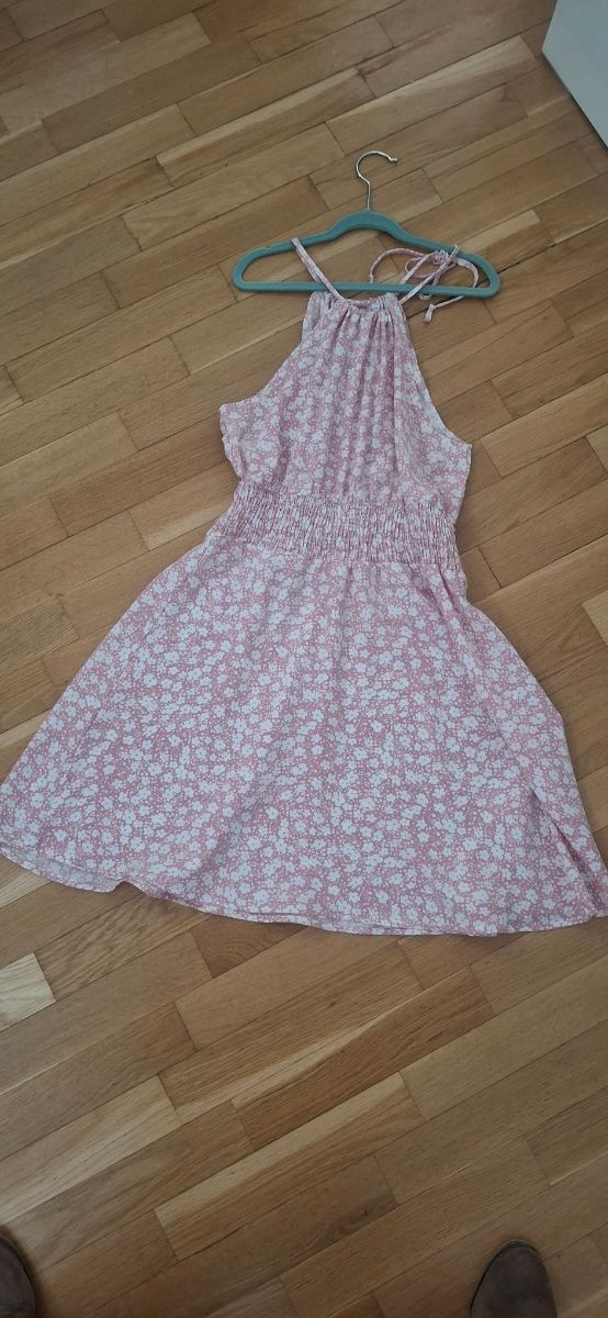 Vestido sin mangas rosa claro