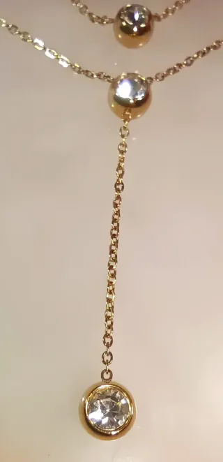 Collar doble dorado con circonitas