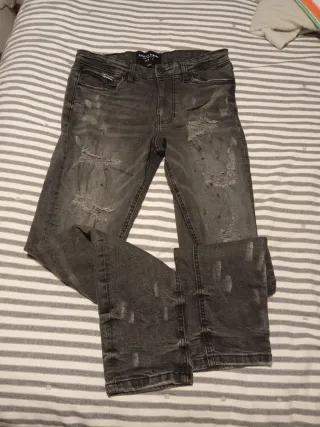 Pantalones vaqueros grises rotos Supply Demand