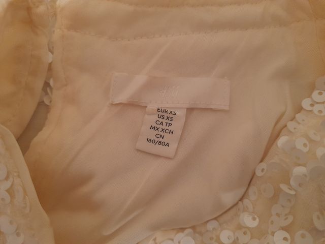 Blusa lentejuelas blanca