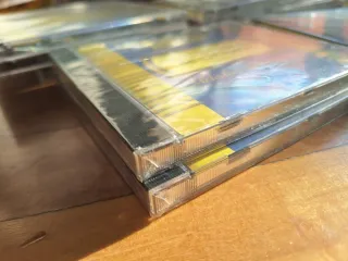 Pack de 22 CDs precintados de música.