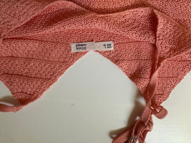 Top de tirantes rosa con flecos