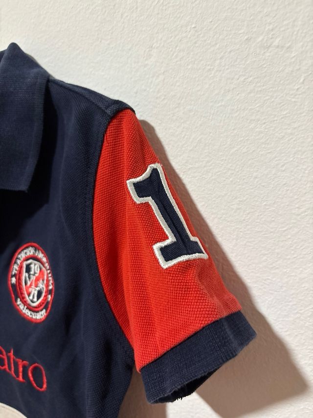 Polo Valecuatro niño azul, beige y rojo