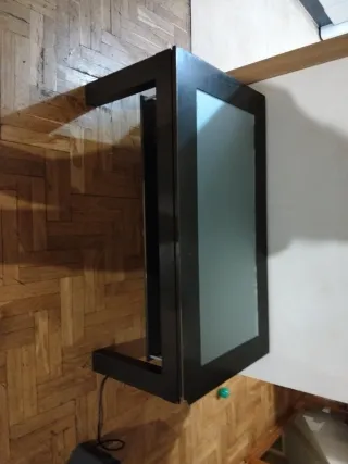 Mesita de comedor de cristal y madera