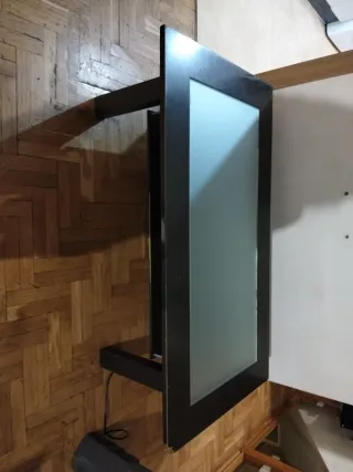 Mesita de comedor de cristal y madera