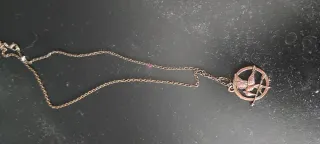 Collana con ciondolo uccello e freccia