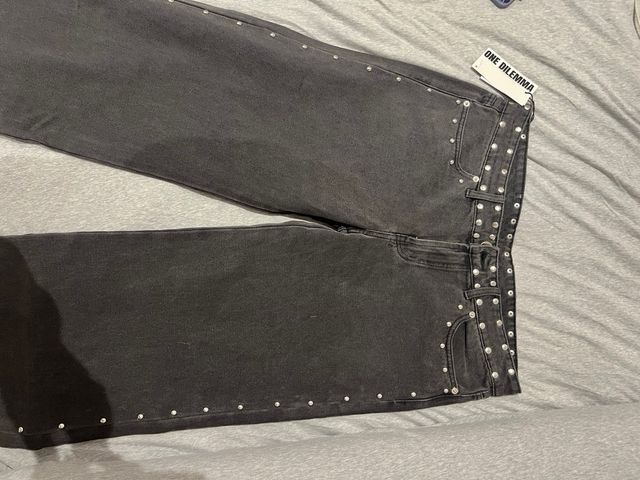 Pantalones ONE DILEMA negros estrellas plata