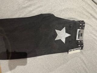 Pantalones ONE DILEMA negros estrellas plata