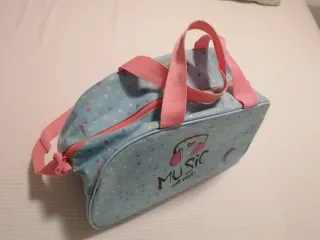 Bolsa de viaje infantil con diseño musical
