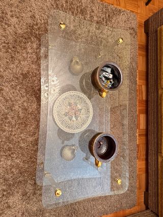 Mesa de salón cristal transparente y oro