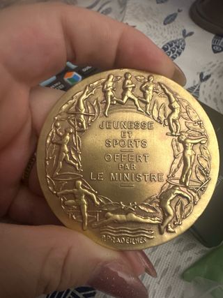 Medalla de mano de bronce juegos olímpicos de Fran