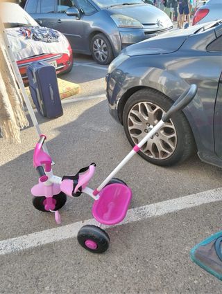 Triciclo niña rosa con empujador
