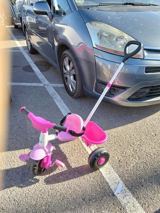 Triciclo niña rosa con empujador