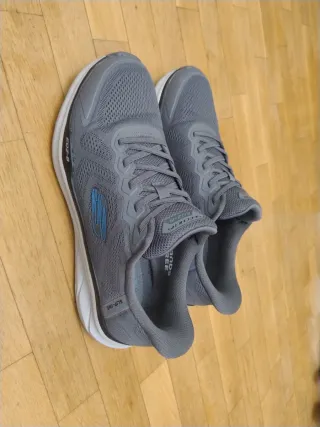 Zapatillas Skechers grises y azules 1 día usado