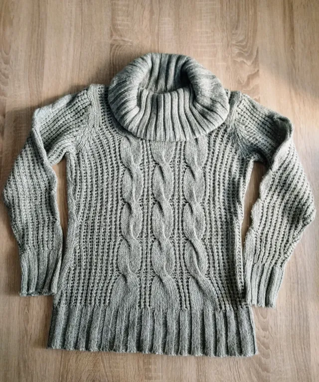 Jersey gris cuello alto trenzado