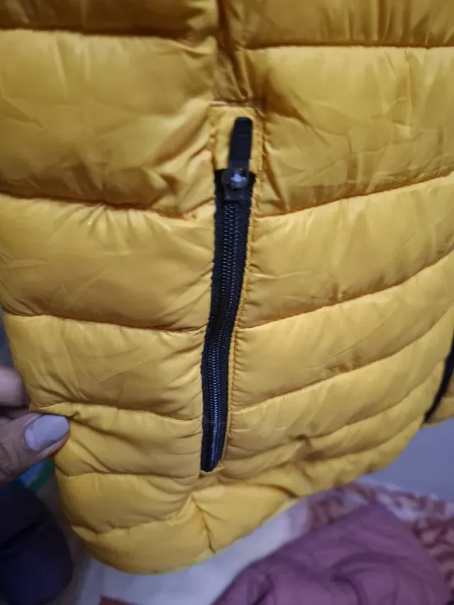 Chaleco acolchado amarillo