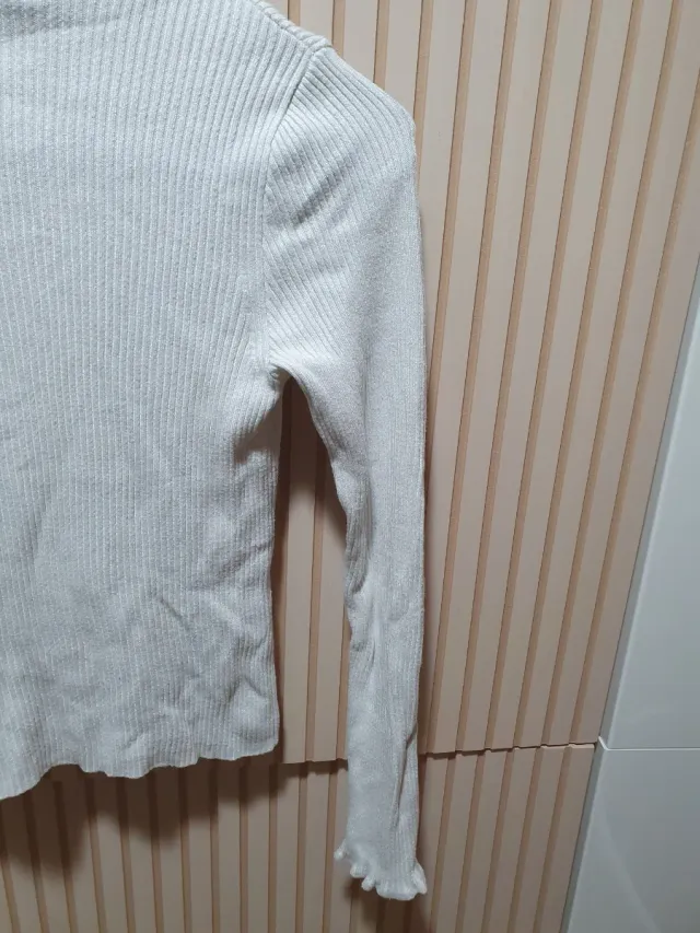 Jersey Stradivarius blanco cuello alto mujer