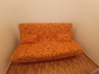 Oportunidad por traslado Sofá cama naranja