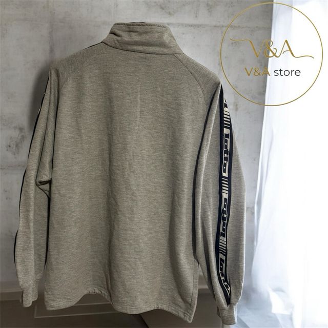 Sudadera Lotto gris con cremallera y logo