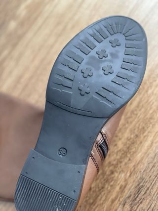 Botas de piel marrones altas