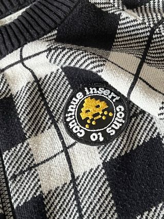 Cardigan a quadri con zip