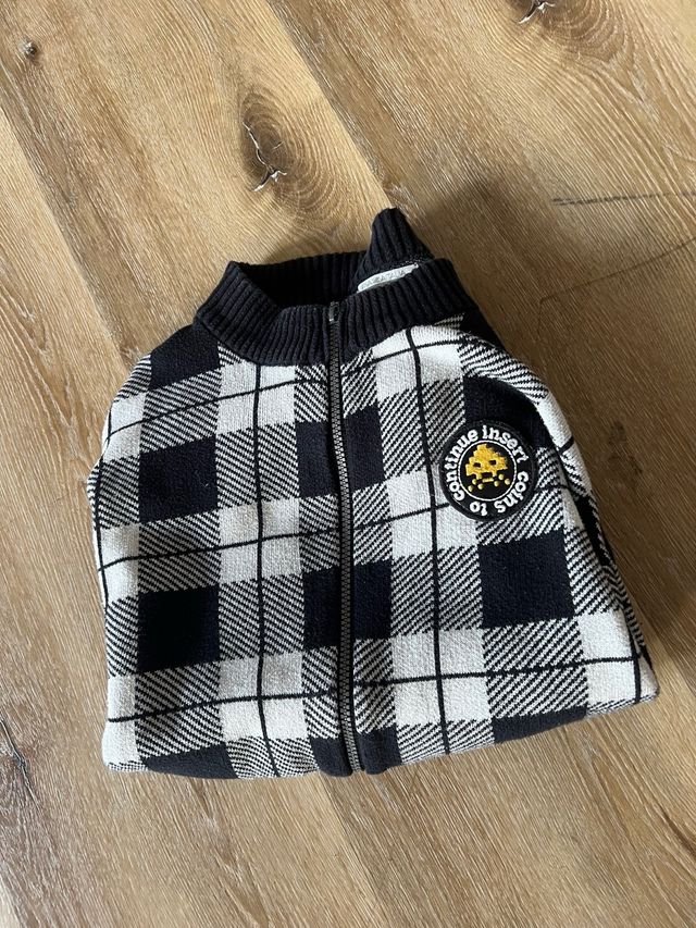 Cardigan a quadri con zip