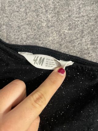 Top negro con purpurina