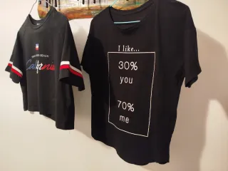 2 Camisetas Negras, Stradivarius y  Bershka