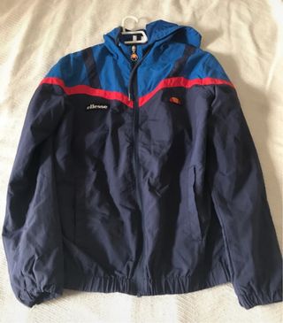 Chaqueta cortavientos Ellesse azul y roja