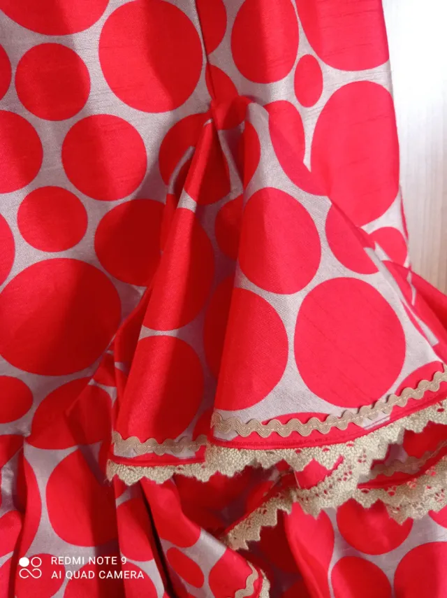 Traje de flamenca rojo con lunares blancos