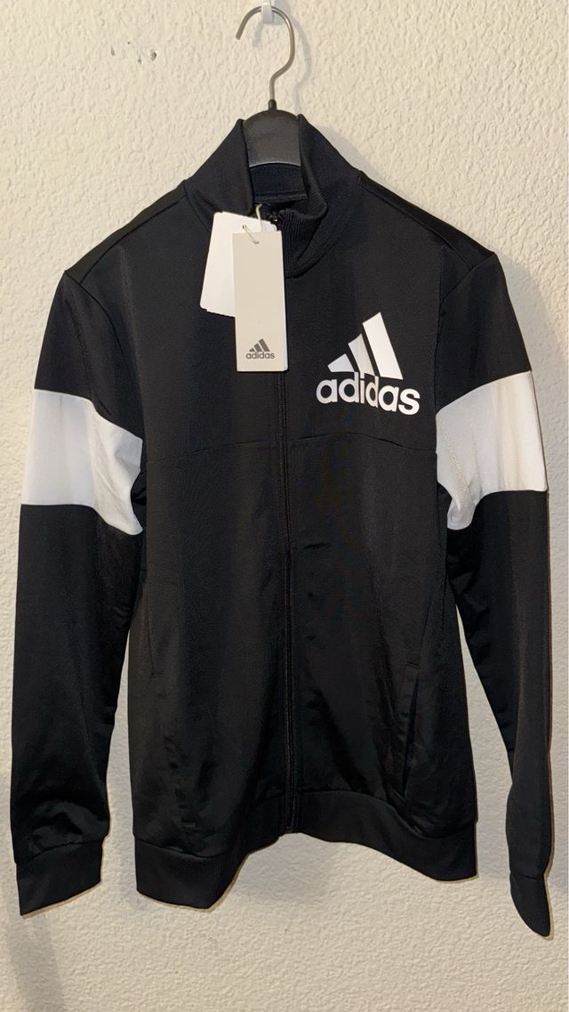 Chaqueta deportiva Adidas negra y blanca