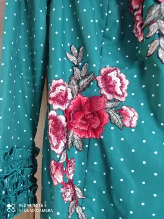 Traje de flamenca verde lunares talla 44