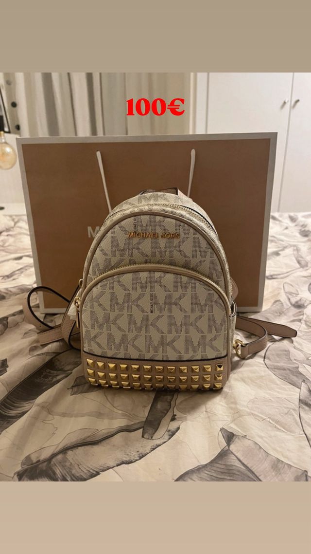 Mochila Michael Kors pequeña beige y dorada