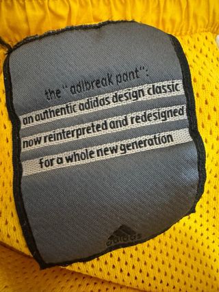 Pantalones Adidas Amarillos con Logo Lateral