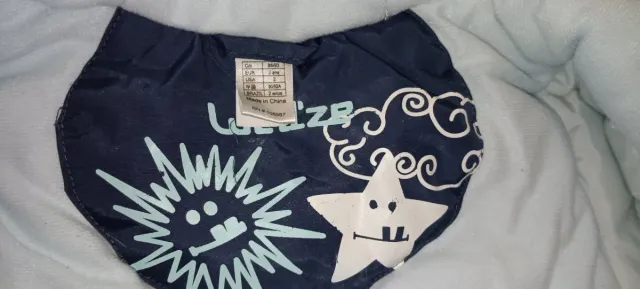 Abrigo impermeable T:2-3 años