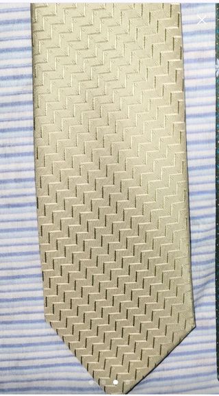 Corbata beige con diseño geométrico