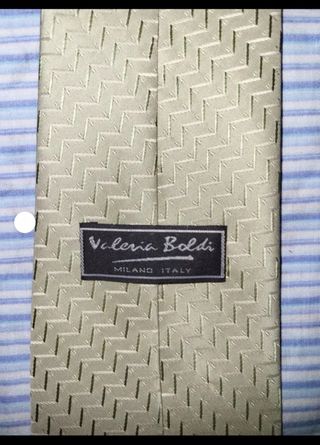Corbata beige con diseño geométrico