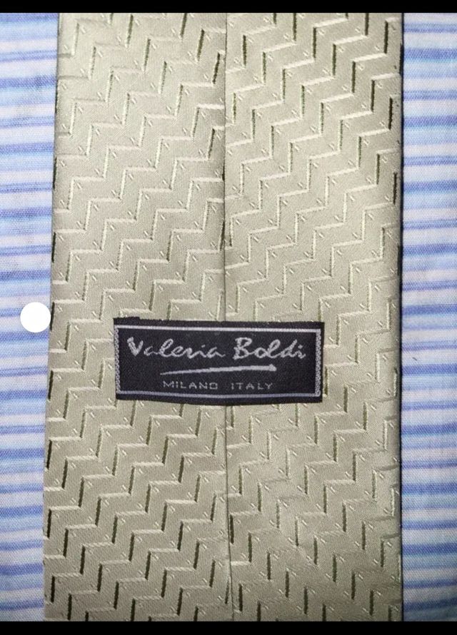 Corbata beige con diseño geométrico