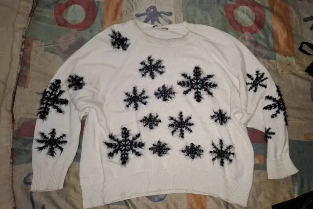 Jersey blanco con copos de nieve
