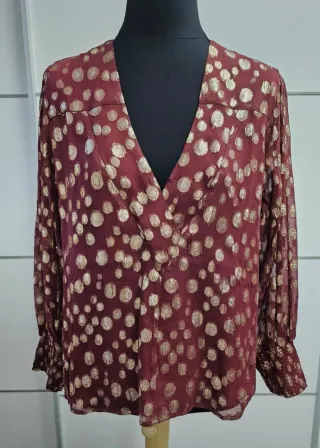 Blusa Maksu con estampado dorado